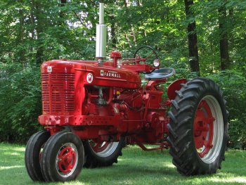 Průkopníkem tříkolové konstrukce byla firma International Harvester