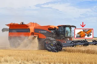 Oranžová sklízecí mlátička Tribine na poli s vloženým schématem
