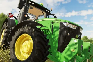 Detail zeleného traktoru John Deere v počítačové hře