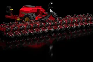 Červený secí stroj Väderstad Tempo L 32 na černém pozadí