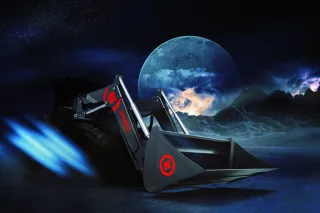 Reklamní grafika čelního nakladače STOLL s lopatou na nočním pozadí.