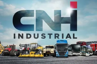 Logo CNH Industrial nad řadou zemědělských a stavebních strojů