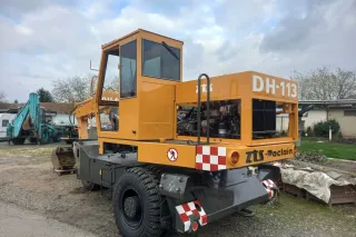 Žlutý kolový nakladač ZTS DH 113