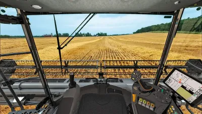 Výhled z kabiny sklízecí mlátičky Fendt Ideal přes žací lištu