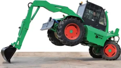 Zelený víceúčelový stroj Roboractor se zvednutým předním kolem