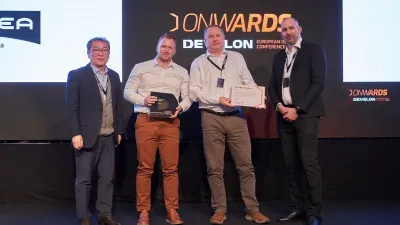 Zástupci společnosti GARNEA s oceněním na konferenci Develon
