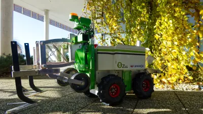 Zelený polní robot pro precizní zemědělství.