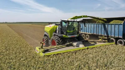 CLAAS JAGUAR 1000 s adaptérem DIRECT DISC 8400 při sklizni celých rostlin