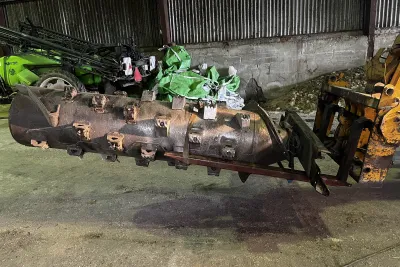 Demontovaný rotor sklízecí mlátičky Case IH Axial-Flow.