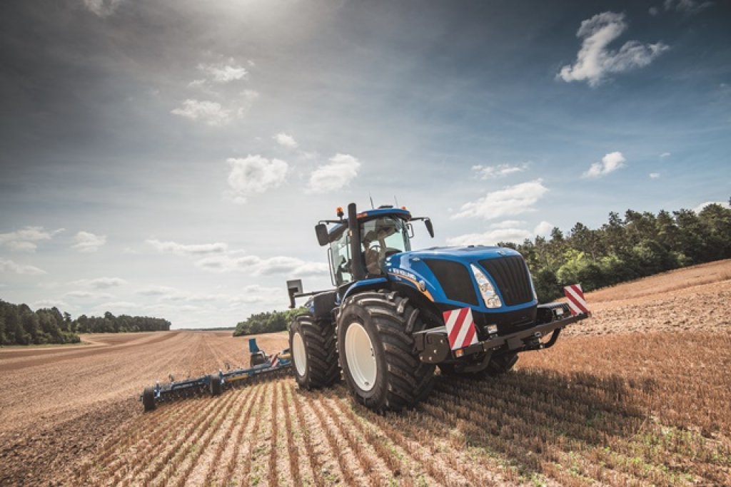 New holland t. Трактор New Holland. Трактор Нью Холланд т9. New Holland t9.670. Трактор Нью Холланд 9.